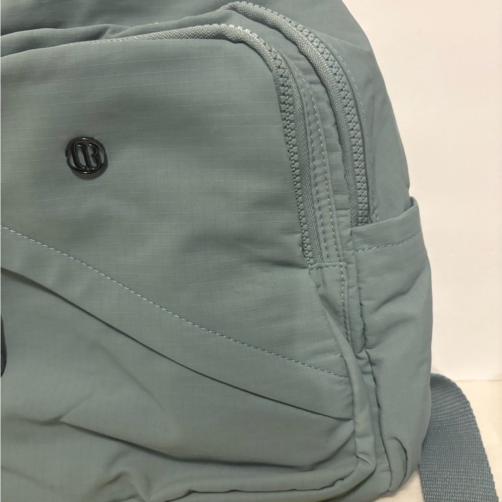 Teal Backpack With Multiple Compartments - image 7